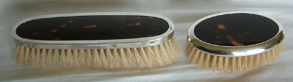 pair of tortoiseshell and sterling silver brushes Birmingham 1925 and 1926